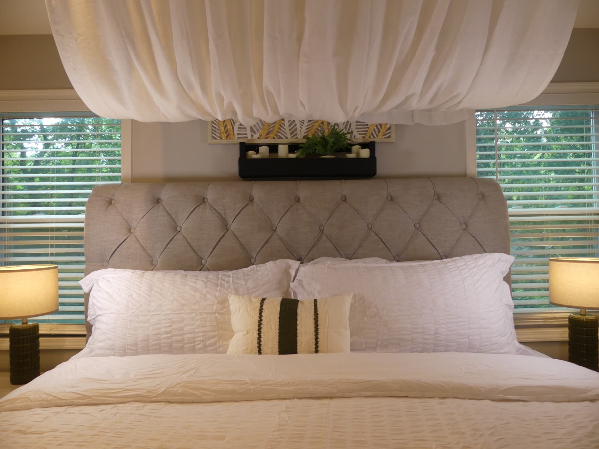 Carver Cottage — primary bedroom with canopy detail