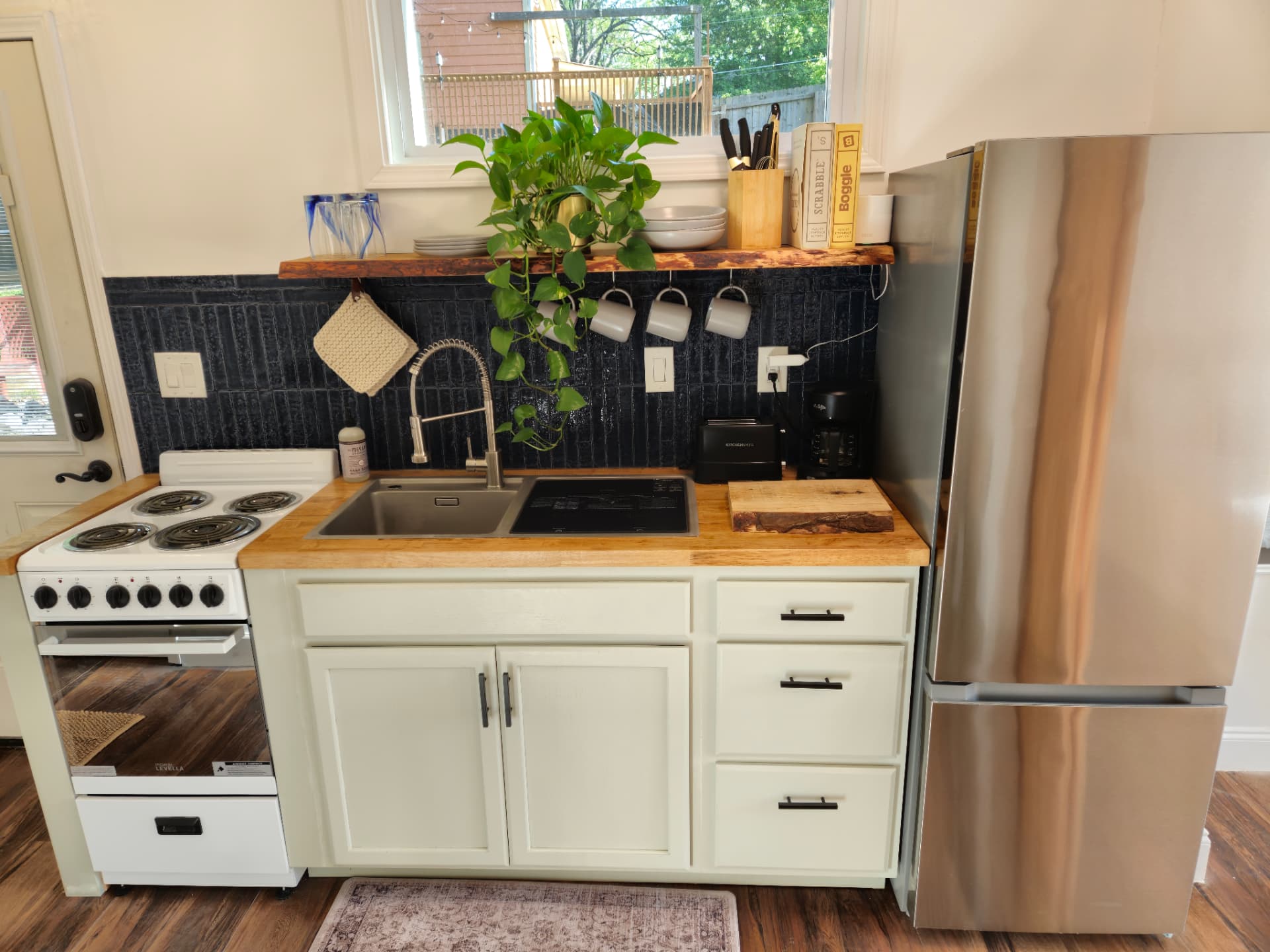 Urban Oasis — full kitchen with butcher block counters