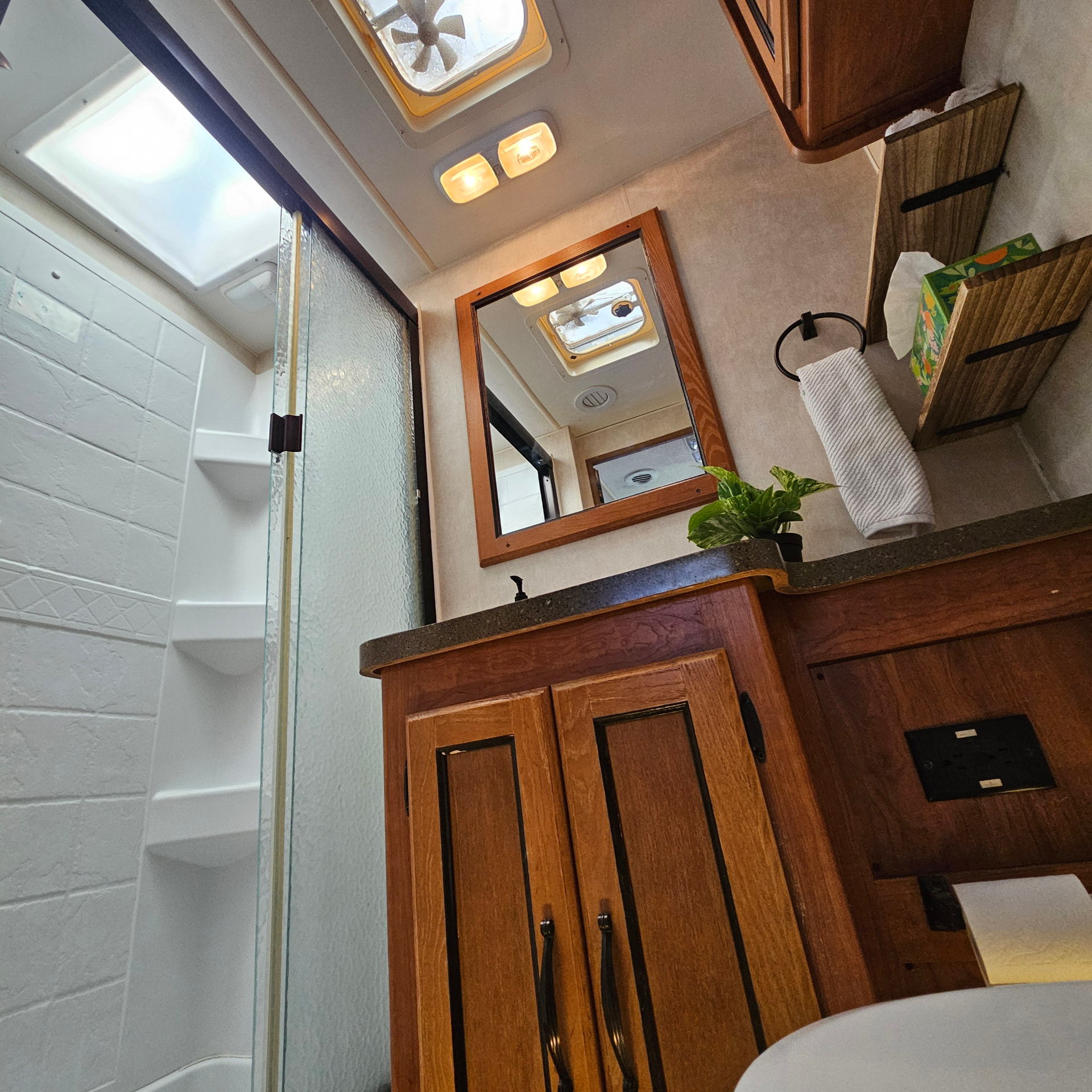 Coachman RV — bathroom with shower, vanity and mirror
