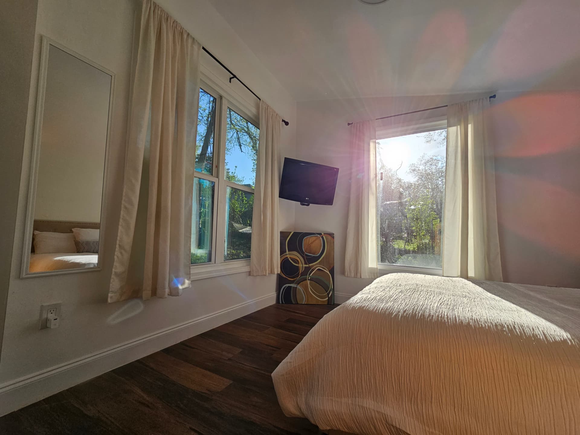 Urban Oasis — bedroom with windows and natural light